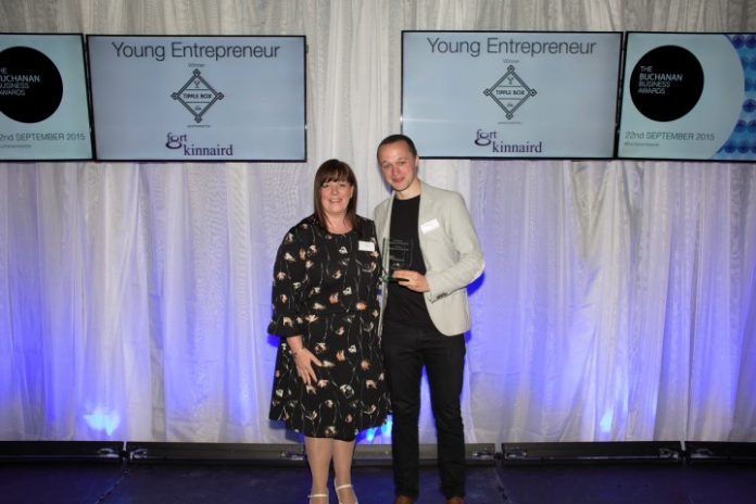 Sonny Charles receives his award Sonny Charles receives his award