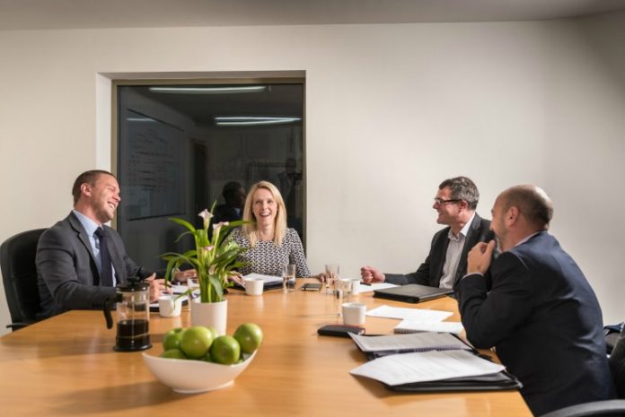 photographs of iMultiply staff in Edinburgh and Glasgow left to right is John Gilbertson, Kirsty Mackenzie, Paul Atkinson and Arturo Carbonell.