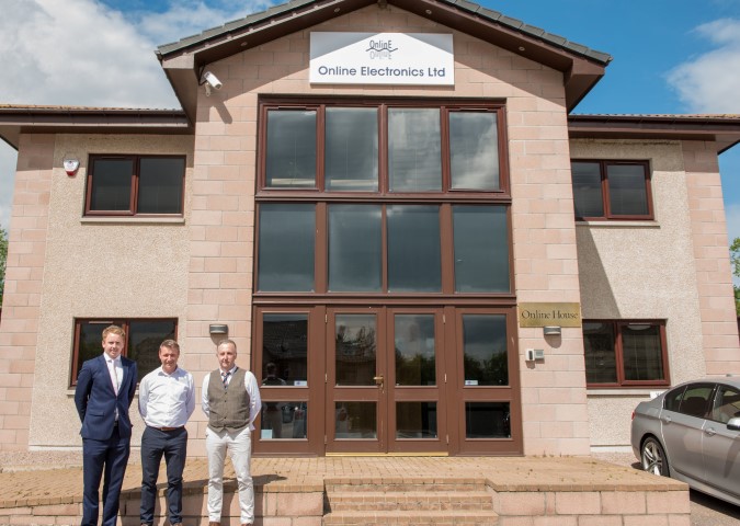(L-R) Iain Landsman from CBRE with Andrew Marwood and John Walsh from Online Electronics
