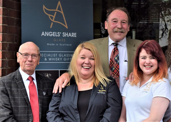 Charles MacLean (back row). From left to right at the front are owners Tom Young and Karen Somerville with glassmaker Bee Hardy.